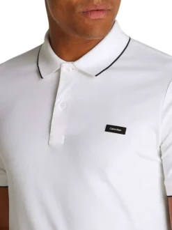 Polo à manches courtes en coton blanc uni à coupe ajustée avec des liserés noirs