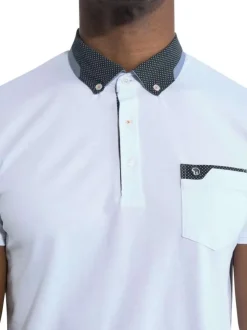 Polo à manches courtes en coton blanc uni à coupe droite et col boutonné