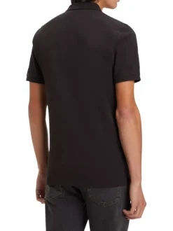 Polo manches courtes, en coton noir uni, à col 2 boutons et coupe slim
