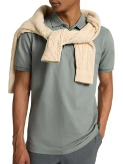 Polo à manches courtes en coton vert uni avec une coupe slim fit