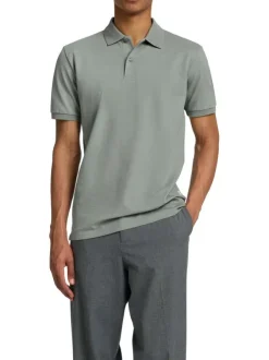 Polo à manches courtes en coton vert uni avec une coupe slim fit