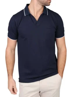 Polo manches courtes marine uni avec un col à revers et une coupe droite