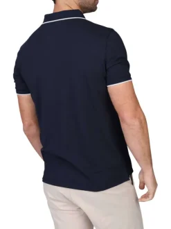 Polo manches courtes marine uni avec un col à revers et une coupe droite
