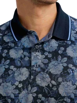 Polo marine floral pourvu de manches courtes et d'un col boutonné
