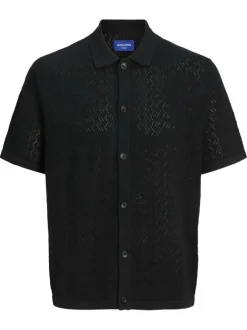 Polo noir à coupe droite pourvu d'un col à revers et de manches courtes