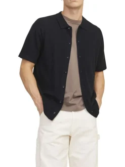 Polo noir uni coupe droite col français et des manches courtes