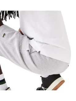 Polo Paris en coton blanc uni coupe droite col boutonné et logo brodé poitrine