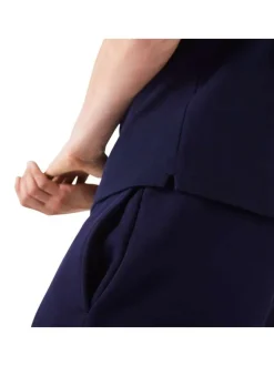 Polo Paris en coton marine uni avec une coupe droite et col boutonné