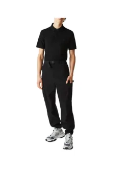 Polo Paris en coton noir uni coupe droite col boutonné et manches resserrées