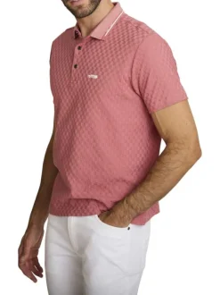 Polo rose à coupe droite pourvu d'un col boutonné et de manches courtes