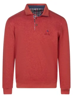Polo rouge uni avec un coupe droite et un col à rabats avec boutons