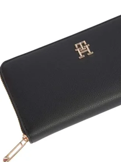 Portefeuille noir uni grainé avec fermeture zippée dorée et monogrammes
