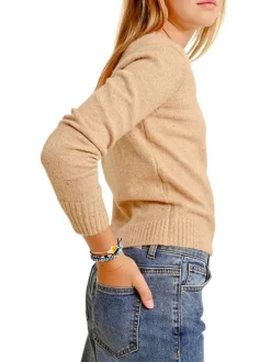 Pull beige uni avec une coupe droite à col rond et des manches longues