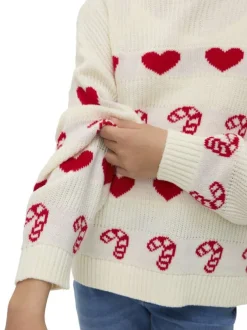 Pull écru tricoté avec des motifs de sucres d'Orge et de coeurs rouges
