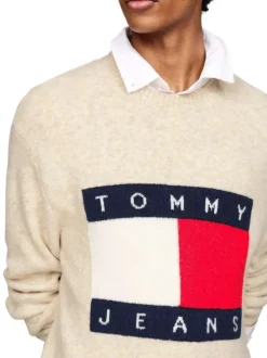 Pull beige chiné avec logo central à coupe droite, col rond et à manches longues