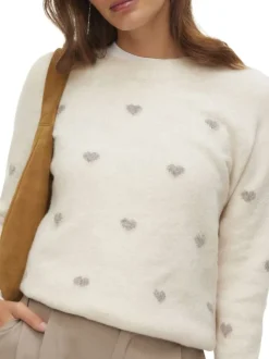 Pull beige coupe ajustée pourvu d'un col rond et de manches longues
