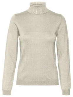 Pull beige pailleté avec une coupe près du corps et un col roulé