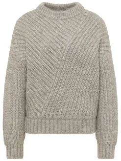 Pull beige uni avec un col rond côtelé et des manches longues