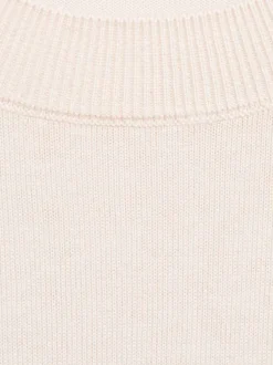 Pull beige uni avec une coupe droite et un col rond à manches longues