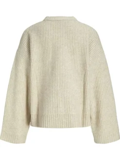 Pull beige uni en maille avec une coupe oversize et un col rond