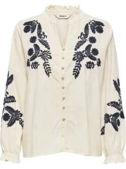 Pull beige uni pourvu de manches longues et d'une coupe droite