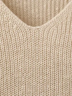 Pull beige uni pourvu d'une coupe droite et de manches longues