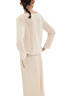 Pull beige uni pourvu d'une coupe droite et de manches longues