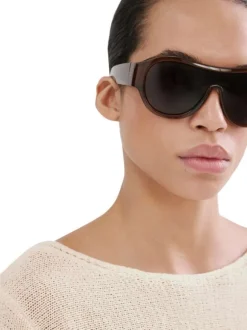Pull beige uni pourvu d'une coupe droite et de manches longues