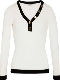 Pull blanc uni pourvu d'un col v à boutons et de manches longues