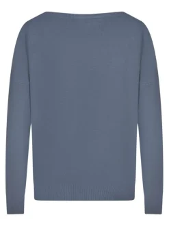 Pull bleu uni pourvu d'une coupe droite et de manches longues