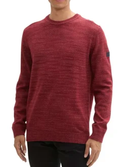 Pull bordeaux uni avec un col rond à coupe droite et un patch d'authenticité