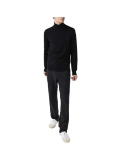 Pull col roulé en laine noir avec crocodile brodé à la poitrine gauche