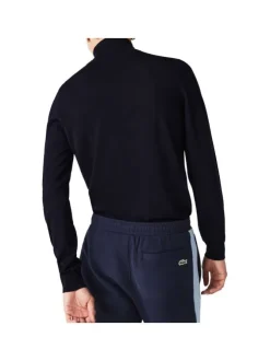 Pull col roulé marine en laine avec crocodile brodé à la poitrine gauche