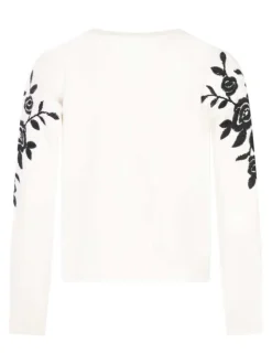 Pull couleur écru, brodé avec un col rond et des manches longues
