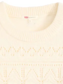 Pull écru en maille ajourée avec une coupe large et des manches longues