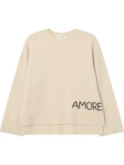 Pull écru en maille fine avec une coupe ample et un col rond
