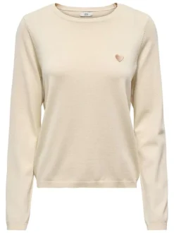 Pull écru uni avec une coupe droite et des manches longues