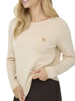 Pull écru uni avec une coupe droite et des manches longues