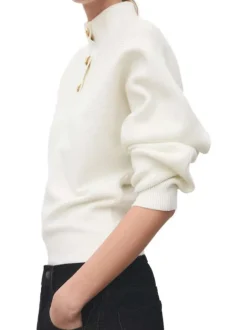 Pull écru uni en maille avec une coupe ample et des manches longues