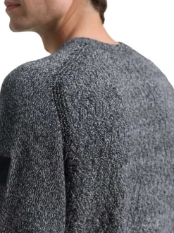 Pull en coton anthracite moucheté avec un col rond et des manches longues