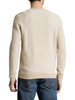 Pull en coton beige à rayures avec une coupe droite et un col rond