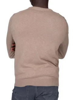 Pull en coton beige uni avec logo iconique et une coupe droite à col v