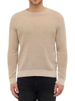 Pull en coton beige uni avec un col rond et des manches longues