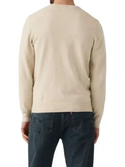 Pull en coton beige uni avec un col rond et des manches longues