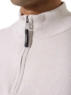 Pull en coton beige uni avec un col zippé et des manches longues
