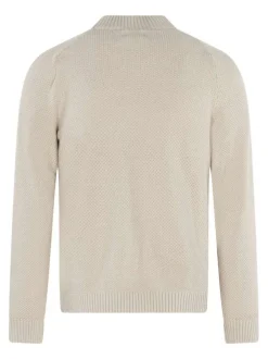 Pull en coton beige uni avec une coupe ajustée et un col montant