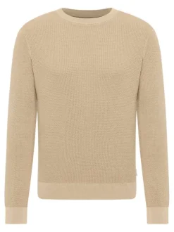 Pull en coton beige uni avec une coupe droite et un col rond