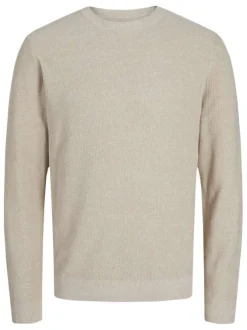 Pull en coton beige uni effet texturée avec une coupe droite et un col rond