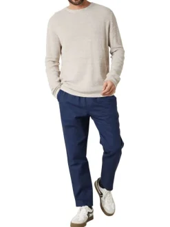 Pull en coton beige uni pourvu d'une coupe droite et d'un col rond