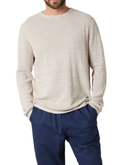 Pull en coton beige uni pourvu d'une coupe droite et d'un col rond